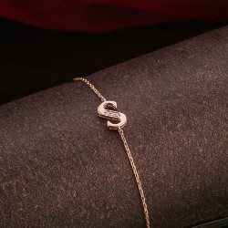 Armband. Rotgold & Brillanten