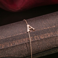 Armband. Rotgold & Brillanten