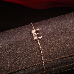 Armband. Rotgold & Brillanten