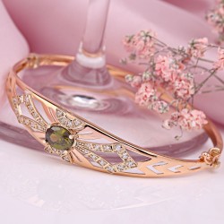 Goldener Armreifen "Prinzessin". Chrysolith & Zirkonia