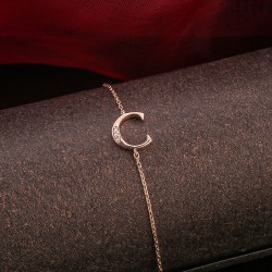 Armband. Rotgold & Brillanten