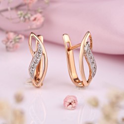 Goldohrringe. Diamanten