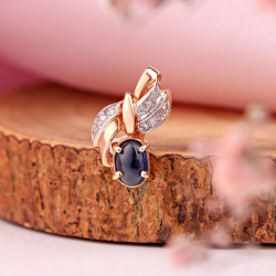 Goldanhänger mit Diamanten und Saphir