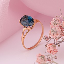 Золотое кольцо из красного золота 585 пробы. Топаз Лондон и фианиты