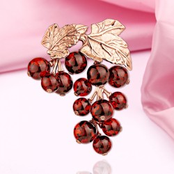 Vergoldete Silberbrosche mit Bernstein "Beeren"
