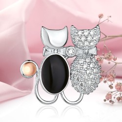 Silberbrosche mit Gold "Kaetzchen". Zirkonia & Onyx