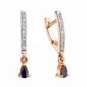 Goldohrringe mit einem Pfad aus Diamanten und Saphiren