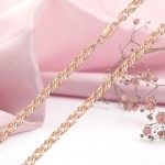 Rotgoldhalskette. Dreifachraute