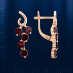 Золотые серьги с гранатом 