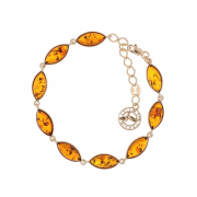 Vergoldetes Silberarmband "Weiblichkeit". Bernstein