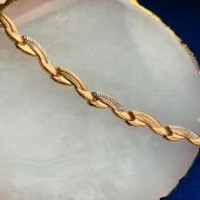 Armband aus Rot/Weissgold 585°