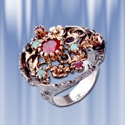 Серебряное кольцо с рубинами, изумудами
