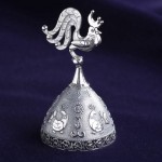 Gloeckchen Goldener Hahn. Silber