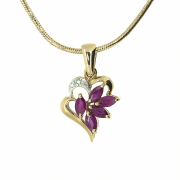 Goldanhänger mit Rubinen und Diamanten