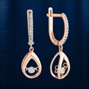 Ohrringe mit tanzendem Brillant