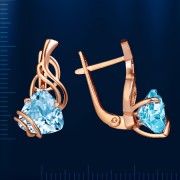Ohrringe mit Topas. Rotgold