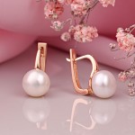 Perlen. Goldohrringe