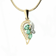 Goldener Anhänger mit Smaragden und Diamanten