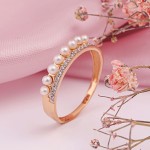 Золотые кольца с жемчугом и фианитами