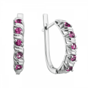 Goldene Ohrringe mit Rubinen