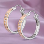 Серьги серебряные с золотыми вставками. Фианиты