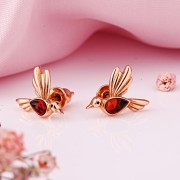 Vergoldete Silberohrstecker "Vögelchen". Bernstein